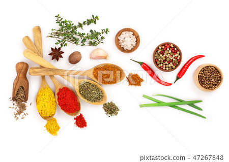 mix of spices in wooden spoon isolated on a white background. Top view. Flat lay. Set or collection 47267848