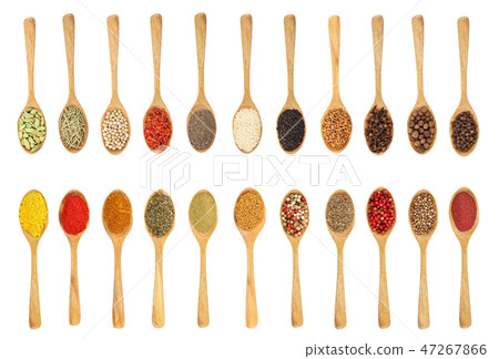 mix of spices in wooden spoon isolated on a white background. Top view. Flat lay. Set or collection mix of spices in wooden spoon isolated on a white background. Top view. Flat lay. Set or collection 47267866