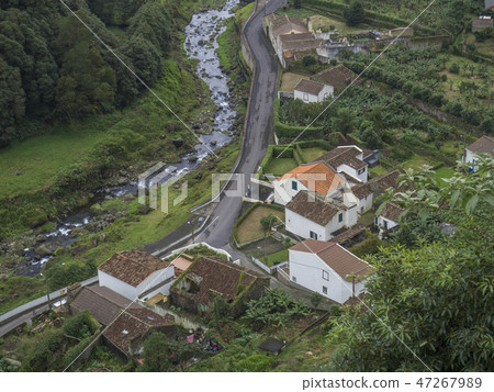 Aerial view of small village Faial da Terra with cascading river, Sao Miguel, Azores. Aerial view of small village Faial da Terra with cascading river, Sao Miguel, Azores. 47267989