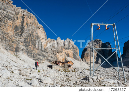 Tourist with hiking backpacks in mountain hike Tourist with hiking backpacks in mountain hike 47268857
