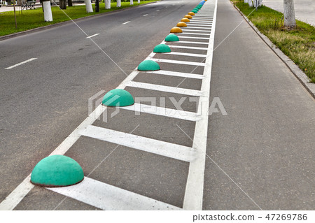 Cycle track or bikeway with markings on roadway Cycle track or bikeway with markings on roadway 47269786