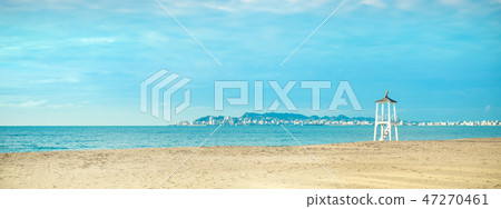 View of the sandy beach of the sea coast. Sunset sky, Durres, Albania. Banner 47270461