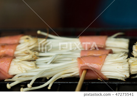 Grilled Bacon enoki Mushroom on old fashion oven 47273541