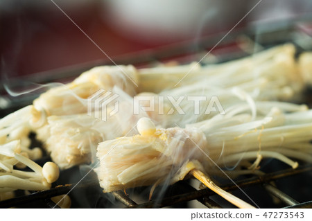 Grilled Bacon enoki Mushroom on old fashion oven 47273543