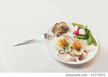 Healthy vegetarian breakfast on a white plate. 47275035