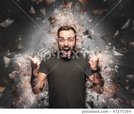 Angry man concept. Shattered elements exploding Angry man concept. Shattered elements exploding 47275164