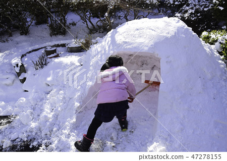 A girl helping to make a pillow A girl helping to make a pillow 47278155