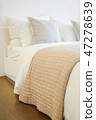 Comfortable bed in modern bedroom interior 47278639
