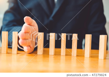 Businessman plan and strategy in business Domino 47279824