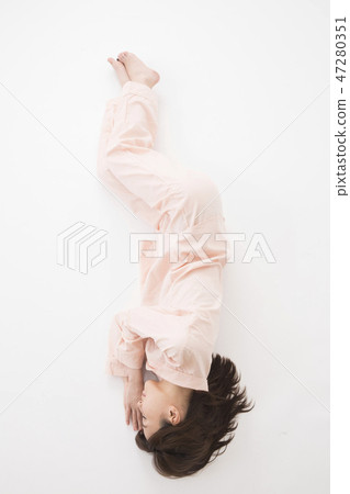 A young woman sleeping A young woman sleeping 47280351