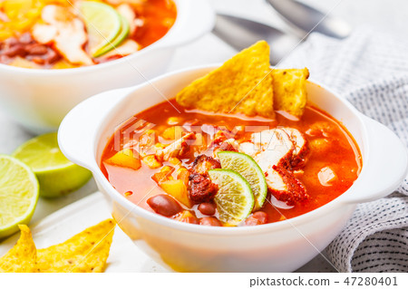 Mexican soup (Chili con carne) with beans, chicken 47280401