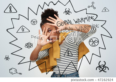 Young woman studio isolated in white covering face shouting scar 47282924