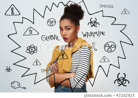 Young woman studio isolated in white crossed arms looking camera 47282925