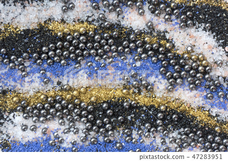 Layered colorful sand pattern. Marble style background. Blue and gold powder texture. 47283951
