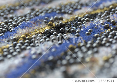 Layered blur sand pattern. Marble style background. Blue and gold powder defocused texture. 47283954