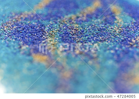 Layered blur sand pattern. Marble style background. Blue and gold powder defocused texture. 47284005