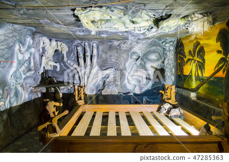 The wall of the room with unusual frightening scul The wall of the room with unusual frightening scul 47285363