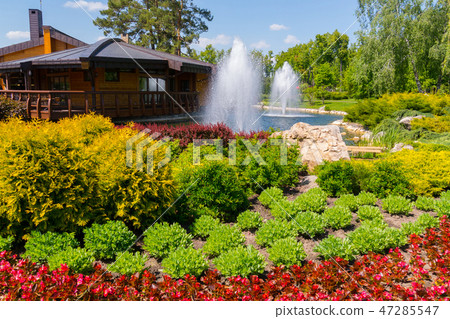 lush high fountains on the lake in the park near t lush high fountains on the lake in the park near t 47285547