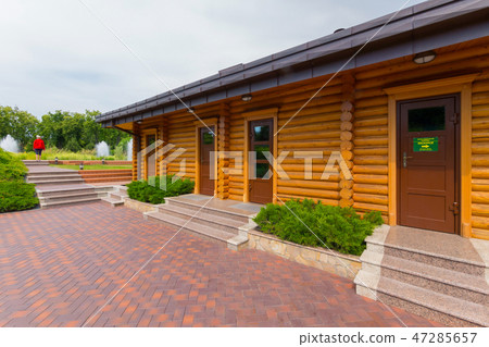 elegantly made neat building of logs and an ideall 47285657