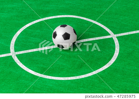 Soccer ball on football field Soccer ball on football field 47285975