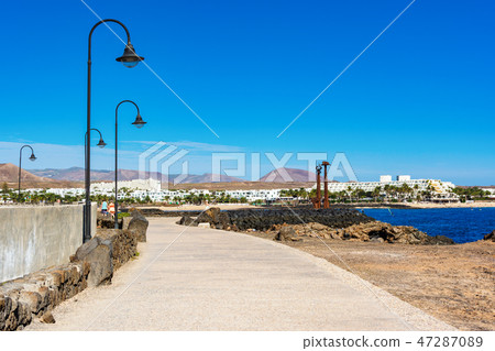 Las Cucharas beach in Costa Teguise, Lanzarote Las Cucharas beach in Costa Teguise, Lanzarote 47287089