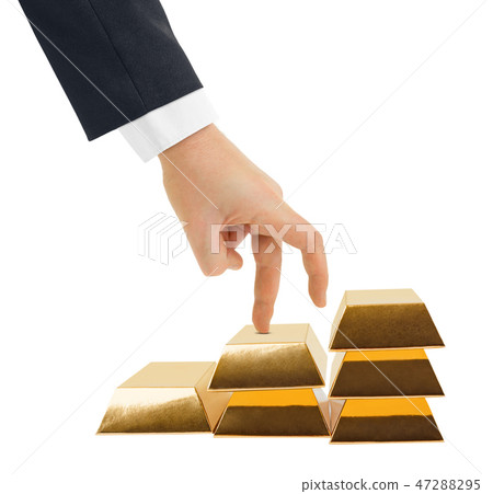 Hand and stairs made of gold bars 47288295