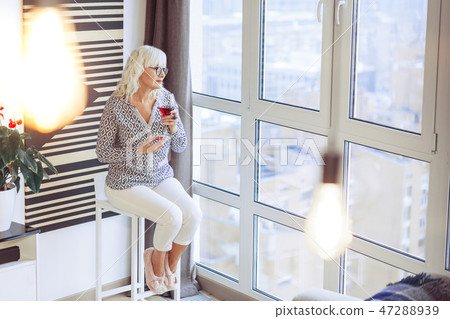 Positive nice woman looking at the city 47288939