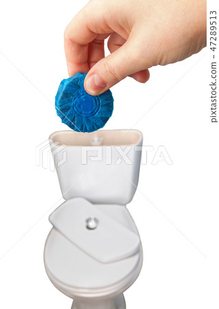 blue cleaning tablet over drain tank toilets. blue cleaning tablet over drain tank toilets. 47289513