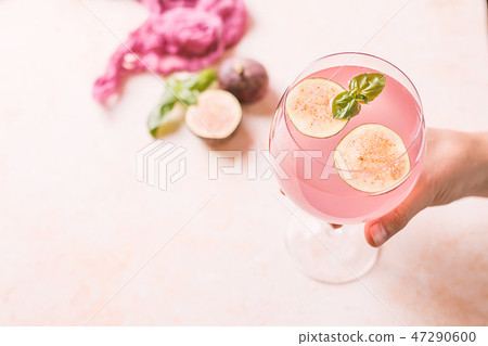 Pink cocktail with fig 47290600