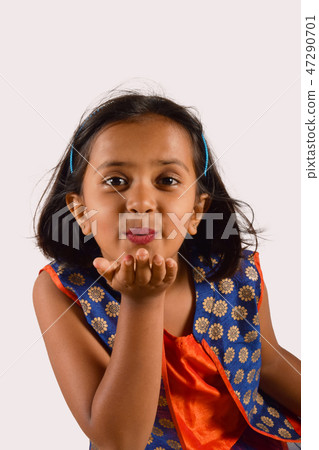 Little girl giving a flying kiss, Pune Little girl giving a flying kiss, Pune 47290701