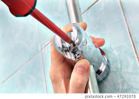 plumbing with screwdriver, adjust angle of shower plumbing with screwdriver, adjust angle of shower 47291078