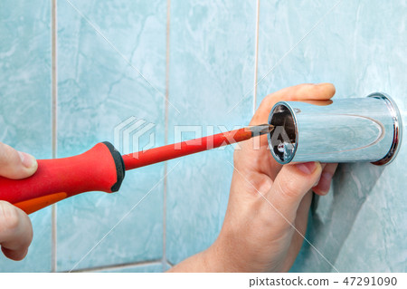 handyman with screwdriver, install bracket handyman with screwdriver, install bracket 47291090