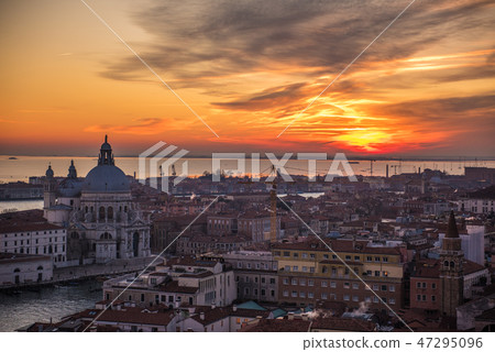 Venice Santa Maria della Salute church and street which stains in the sunset from the bell tower of St. Mark's square Venice Santa Maria della Salute church and street which stains in the sunset from the bell tower of St. Mark's square 47295096