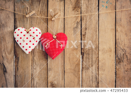 Heart hanging on wood background with copy space. Heart hanging on wood background with copy space. 47295433