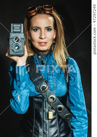 Steampunk with old retro camera. 47297249