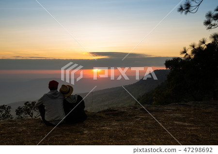 A silhouette of a couple in natural surrounding 47298692