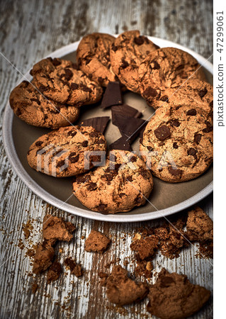 group of tasty cookies next to a bowl 47299061