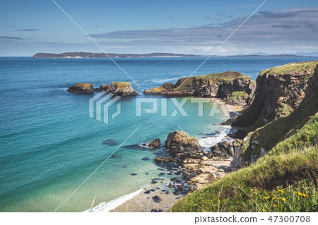 Turquoise ocean water washing Irish shore. Turquoise ocean water washing Irish shore. 47300708