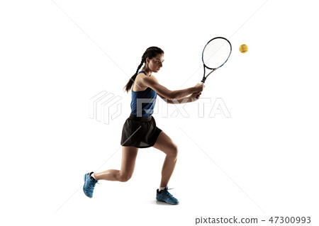 Full length portrait of young woman playing tennis isolated on white background 47300993