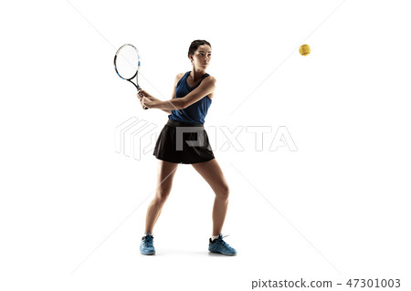 Full length portrait of young woman playing tennis isolated on white background 47301003