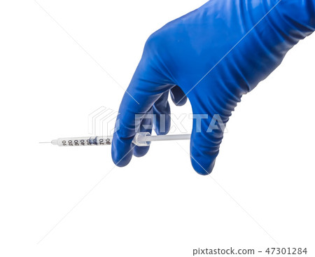Doctor's hand in blue medical glove holding open syringe with medical solution isolated white Doctor's hand in blue medical glove holding open syringe with medical solution isolated white 47301284