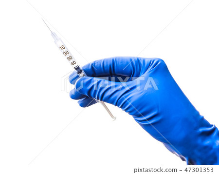 Doctor's hand in blue medical glove holding open syringe with medical solution isolated white Doctor's hand in blue medical glove holding open syringe with medical solution isolated white 47301353