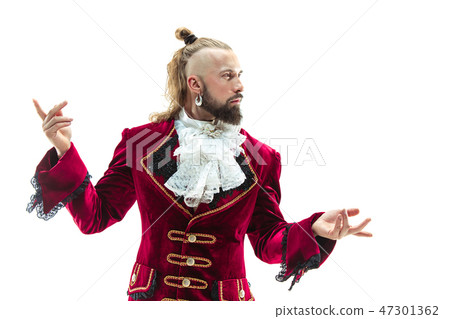 The young man wearing a traditional medieval costume of marquis The young man wearing a traditional medieval costume of marquis 47301362