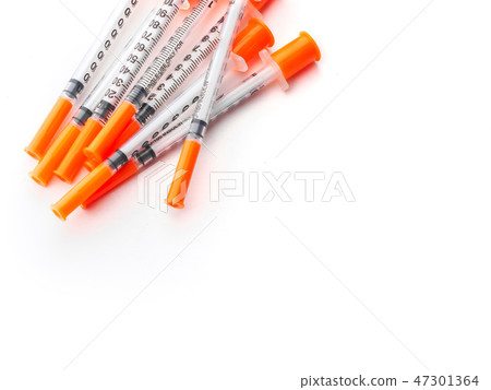 Several insulin syringes for for injection white isolated background Several insulin syringes for for injection white isolated background 47301364