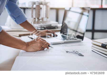 Construction concept, Hands of architect or engineer working for 47301609