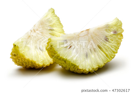 Sliced osage oranges or Maclura Sliced osage oranges or Maclura 47302617