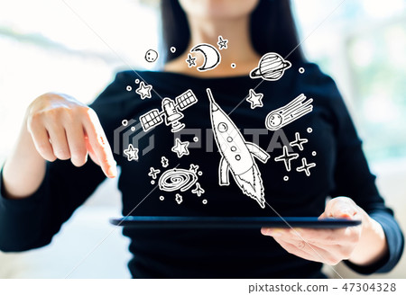 Dream of space and rocket with woman using tablet Dream of space and rocket with woman using tablet 47304328