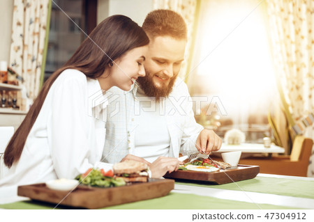 Romantic dinner happy men and women in restaurant Romantic dinner happy men and women in restaurant 47304912