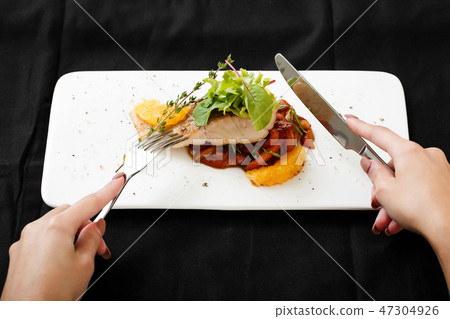 Close up of white fish fillet with vegetable stew Close up of white fish fillet with vegetable stew 47304926