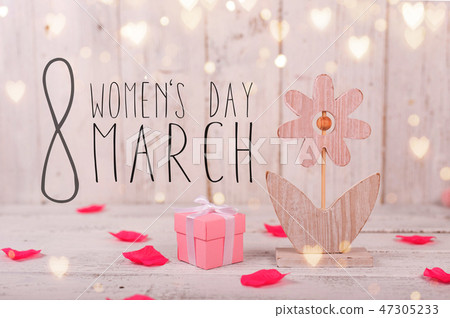 Flowers composition for Women's Day. Pink flowers on old white wooden background. 47305233